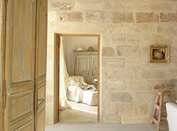 kronos limestone cladding on the inside walls of a French Bastide style farmhouse